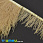 /ru/p40294-perya-strausa-na-lente-8-10-sm-zolotistie-svetlie/