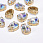 /p53059-shaton-kaplya-k9-14x10-mm-zoloto-beliy-av/