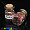 /p26060-butilochka-s-kroshkoy-naturalnogo-kamnya-agat-krasniy-32x22-mm/